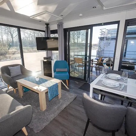 Hausboot Seerose Ferienhaus *